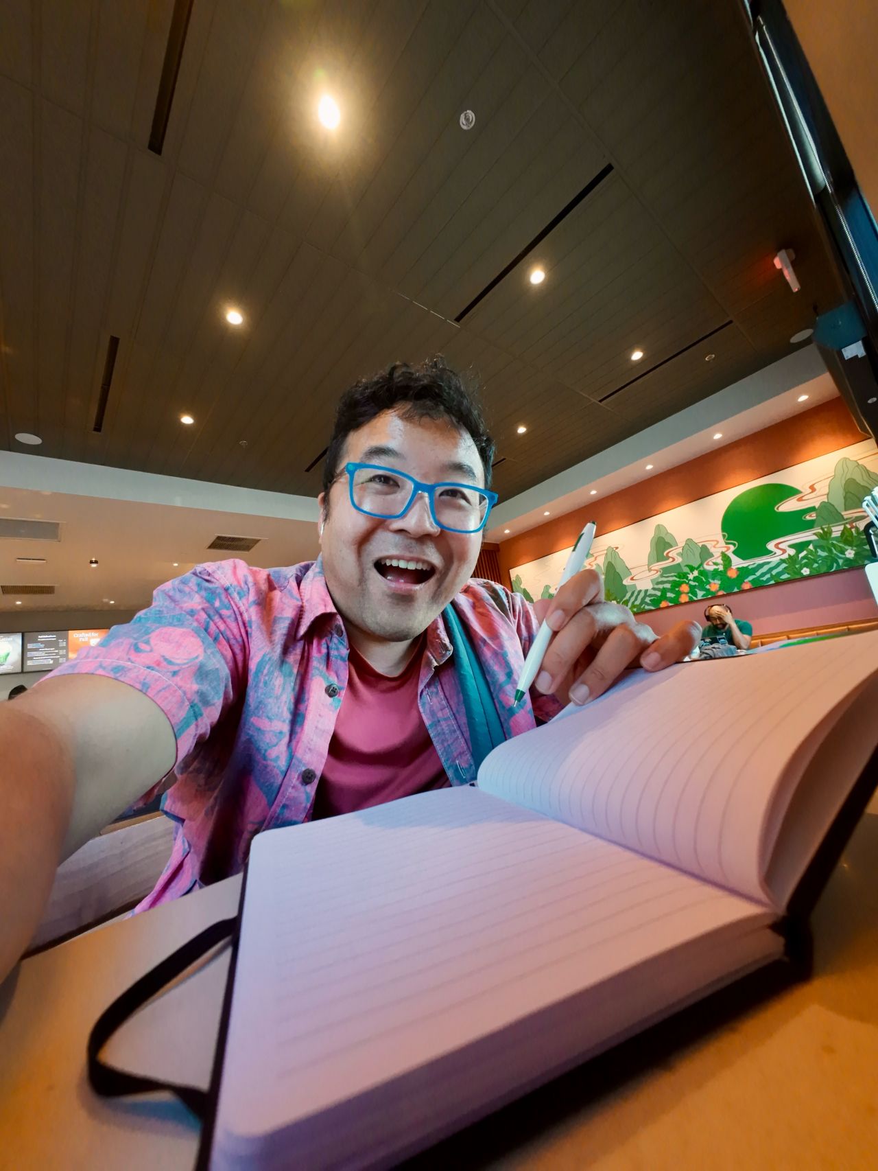 Ed working at a coffee shop